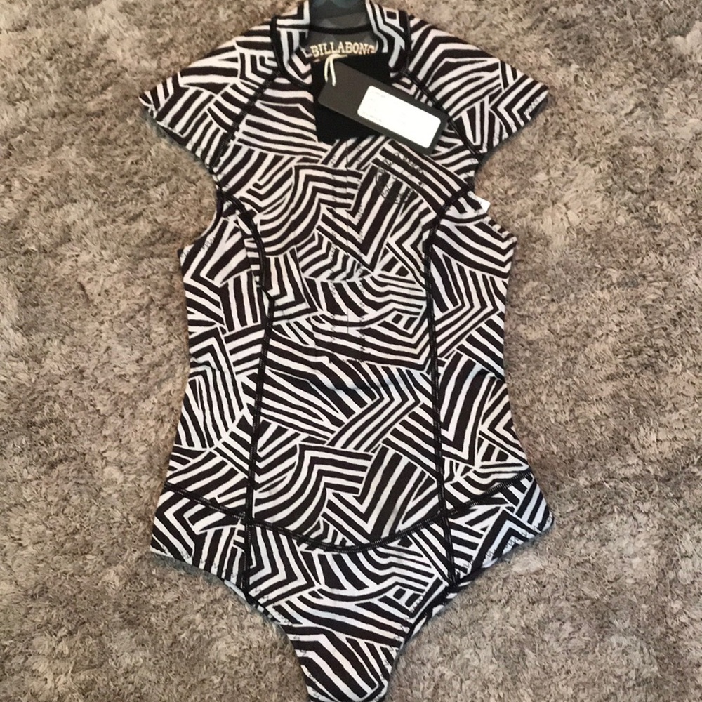 Billabong Woman’s Sz 4 sleeveless wetsuit 1mm